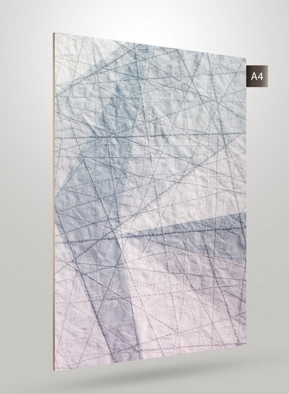 Multi-coloured leather laminate with matte finish, showing wrinkled texture and geometric pattern on a white background.