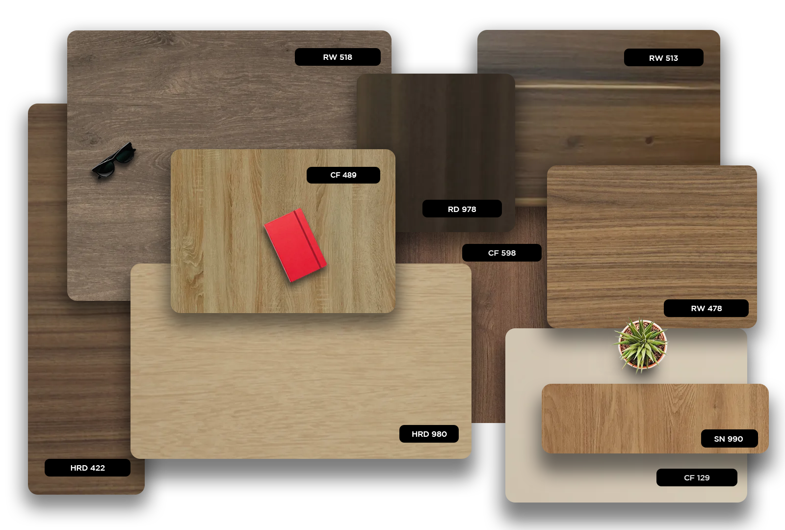 Multi-colored wood grain laminate samples with matte finish and various textures displayed together with accessories and