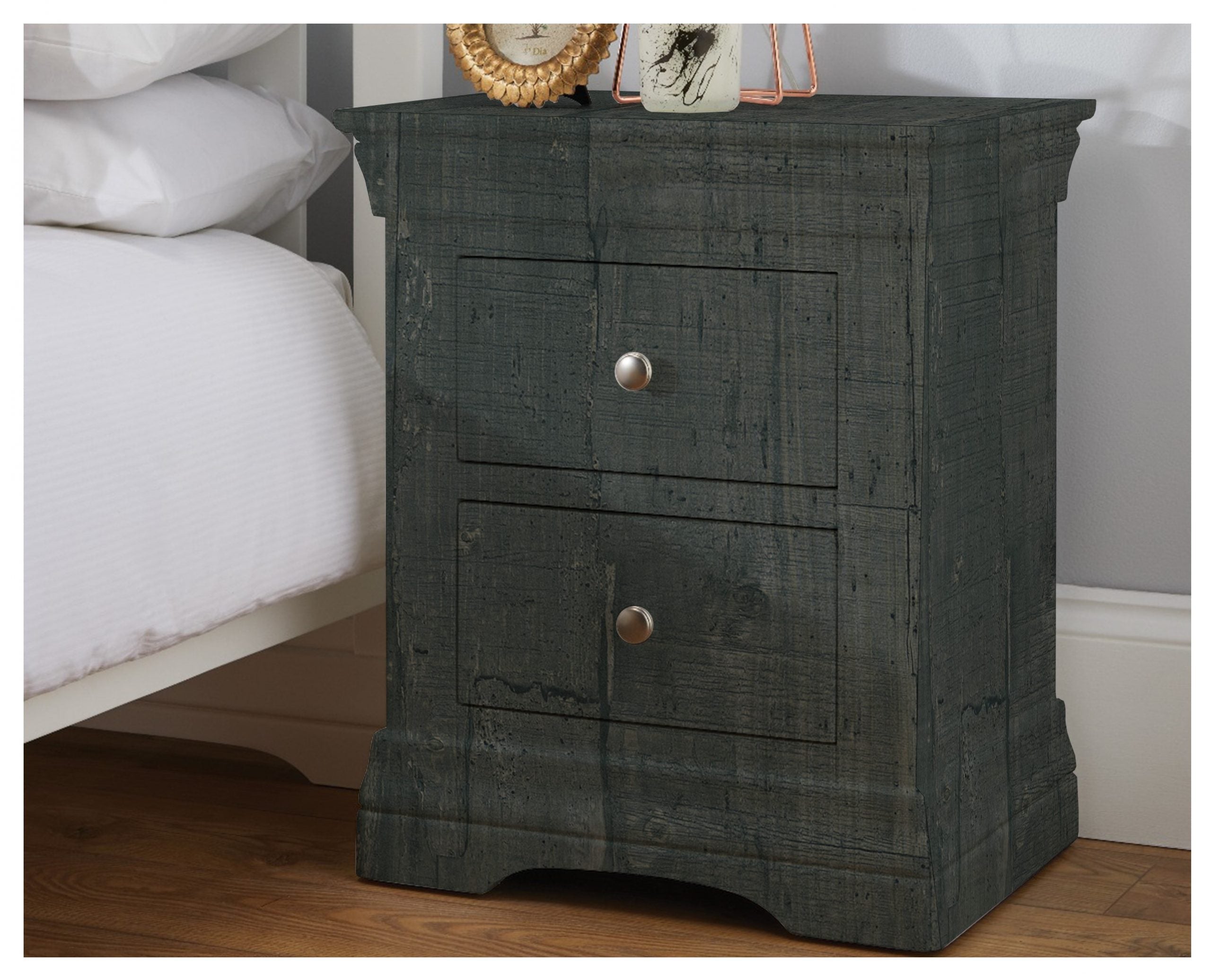 Multi-colour wood laminate nightstand with matte finish and textured wood grain pattern in a bedroom setting.