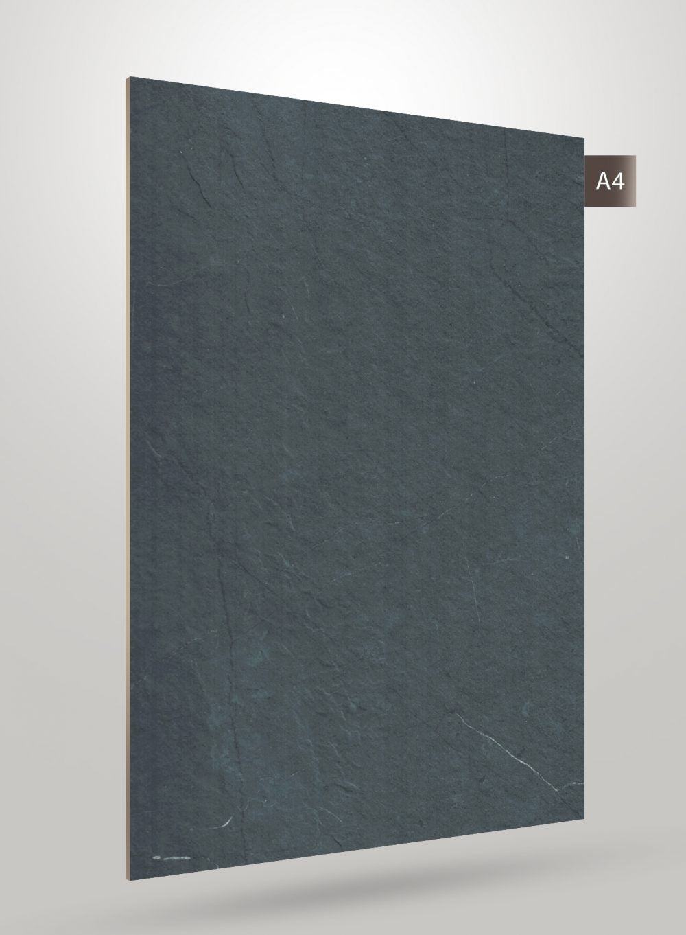 Grey stone laminate with matte finish and textured surface, showing subtle veining and scratches, decorative interior