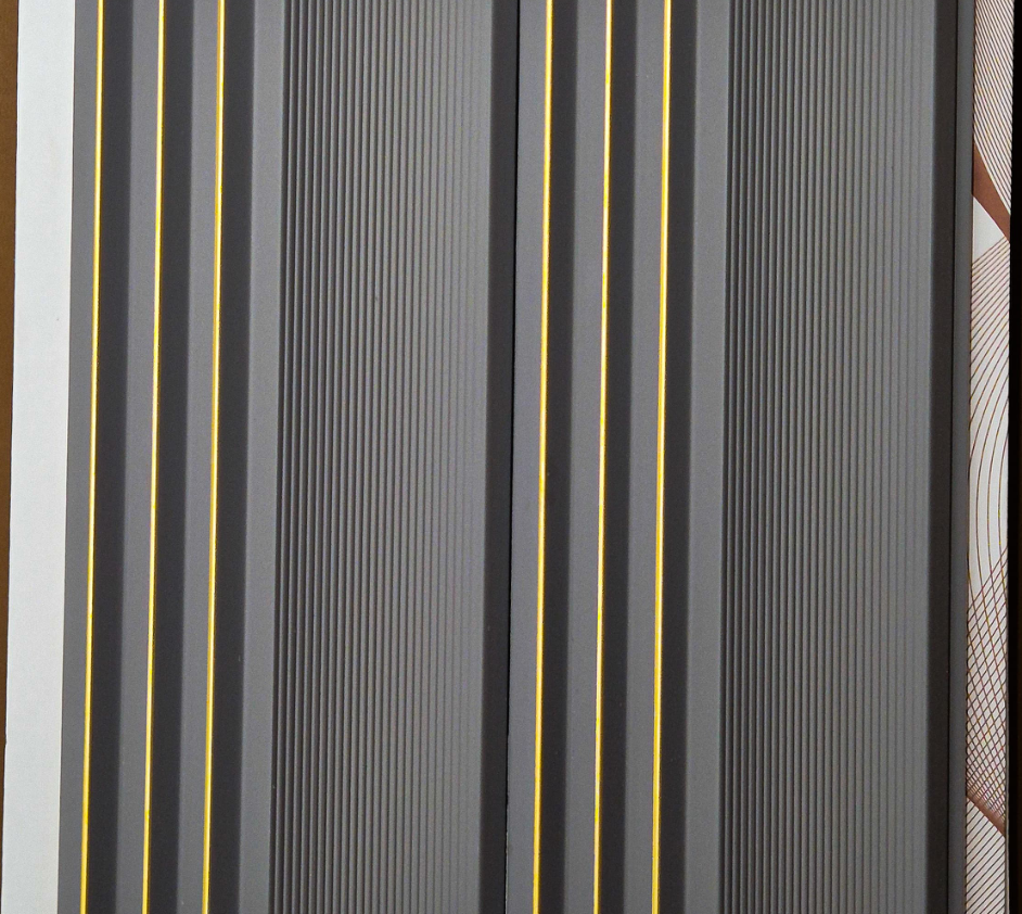 Metaluxe Charcoal Fluted Panel louver panel, a charcoal-grey fluted panel with gold pinstripe trim