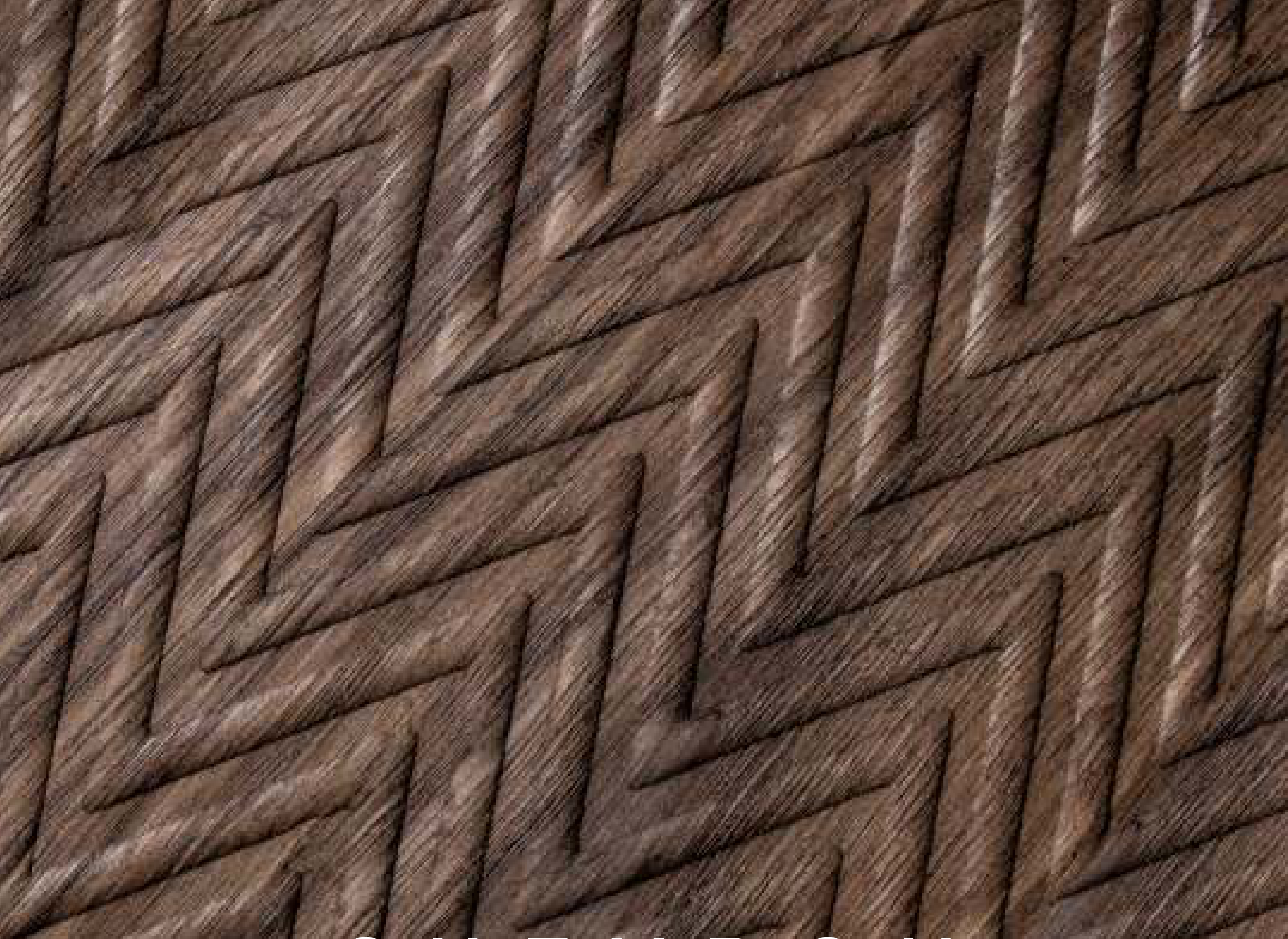 Chevron hybrid veneer panel — brown real-wood veneer with a 3D geometric design embossed texture.