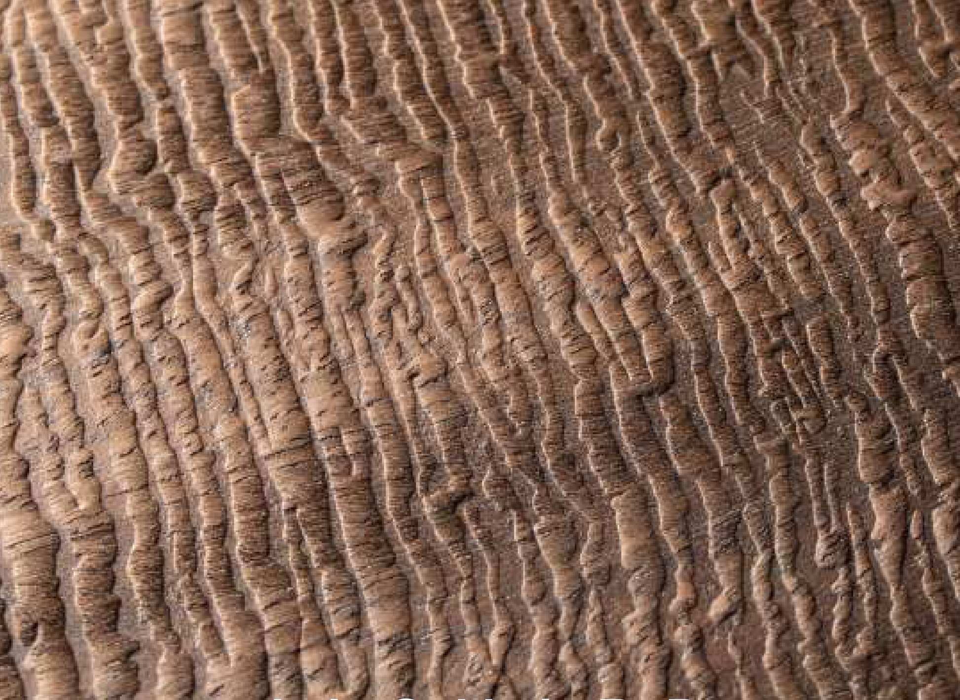 Jaguard hybrid veneer panel — brown real-wood veneer with a 3D fabric embossed texture.