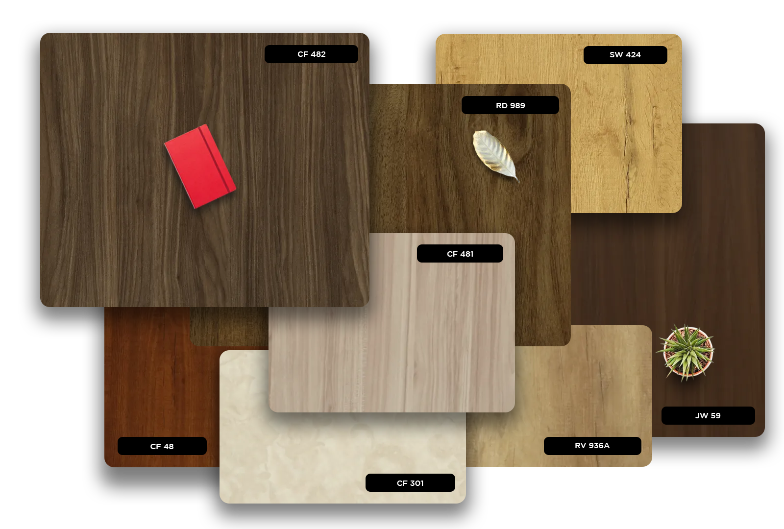 Wood grain laminate samples with various colours and textures, including matte finishes and decorative elements, showcasing
