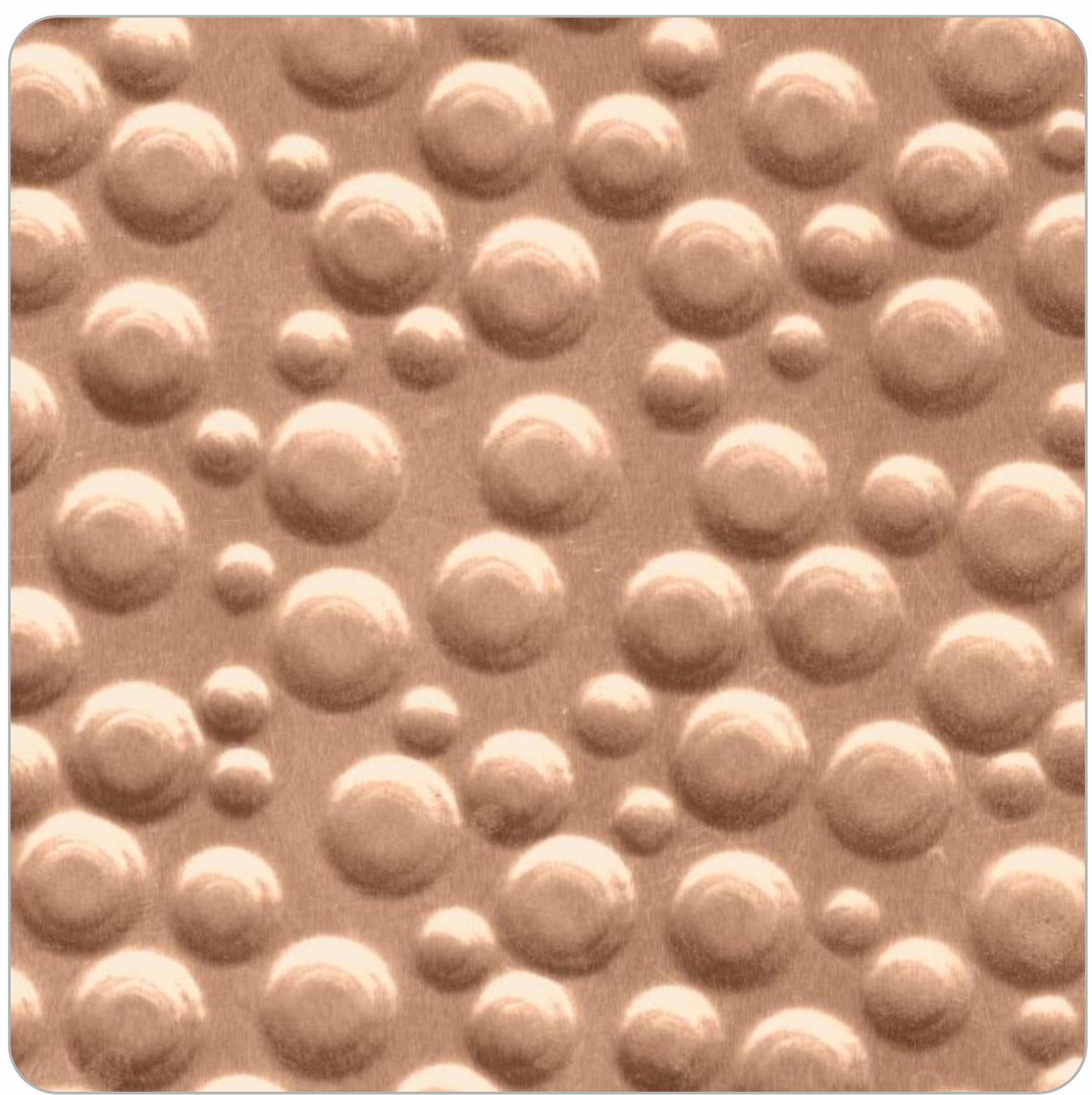 Beige laminate sheet with textured, embossed circular pattern and smooth sheen.