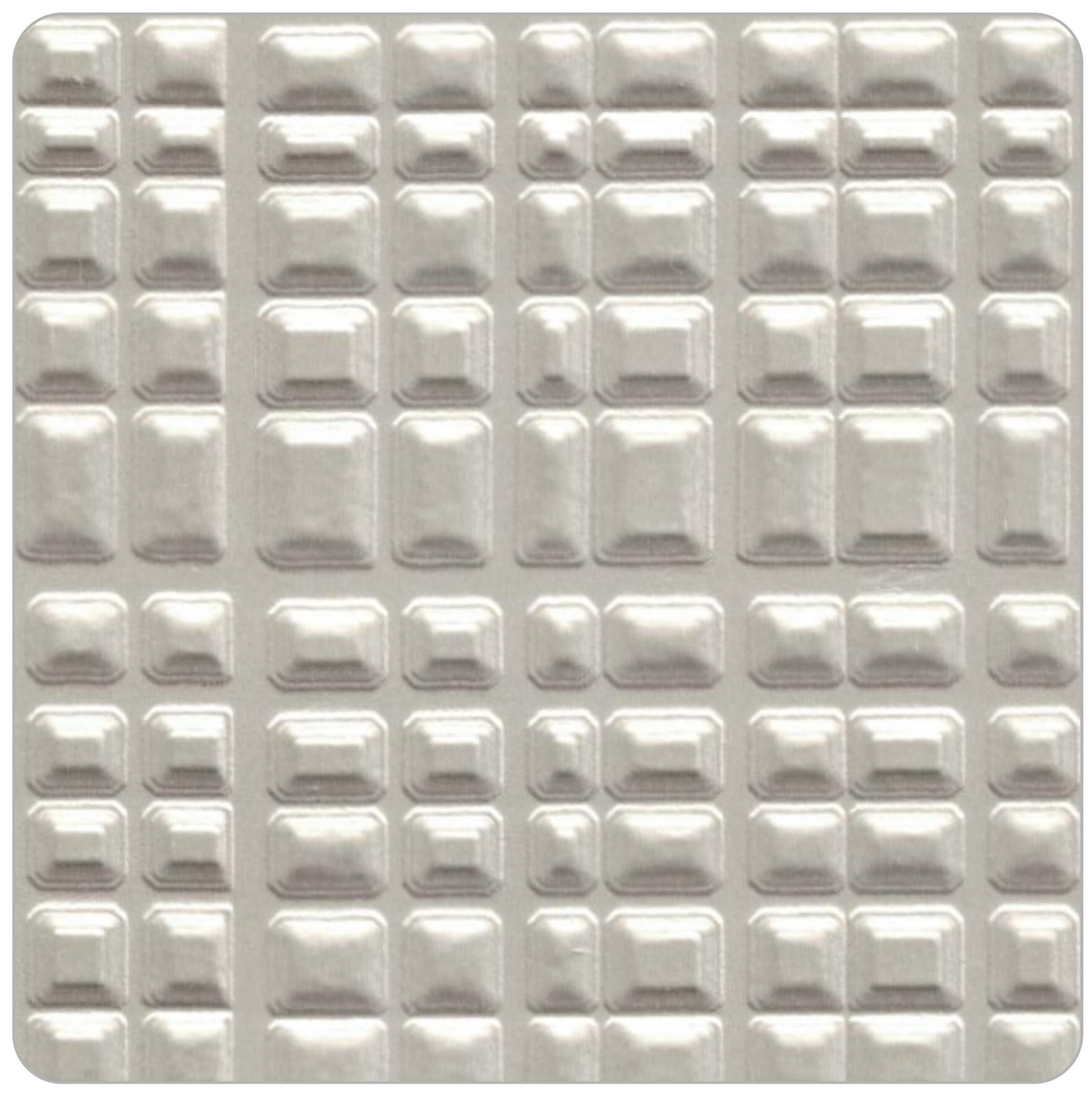 Silver laminate with glossy, geometric pattern of raised rectangular shapes.