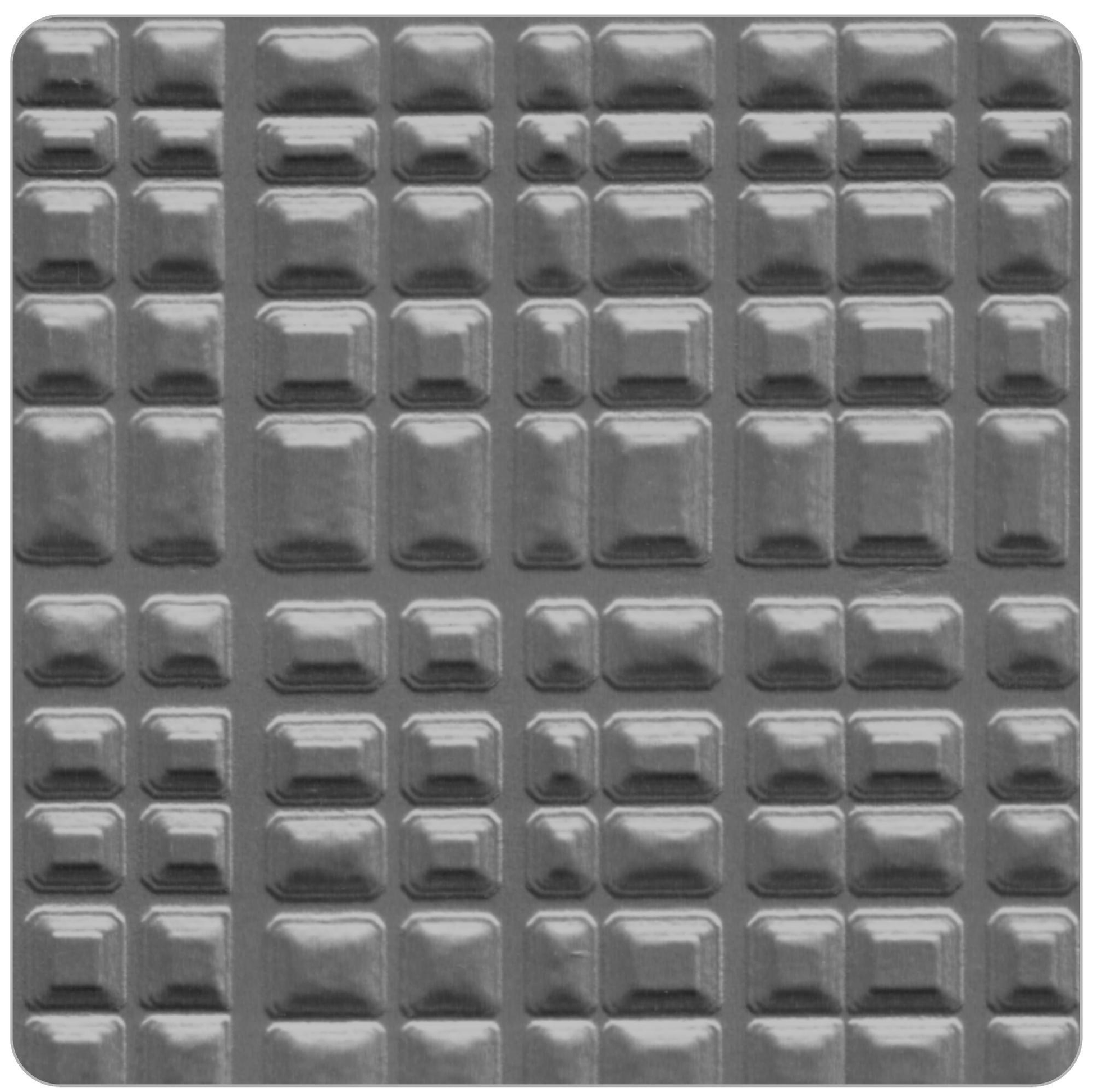 Grey glossy laminate with geometric pattern of raised rectangular shapes.
