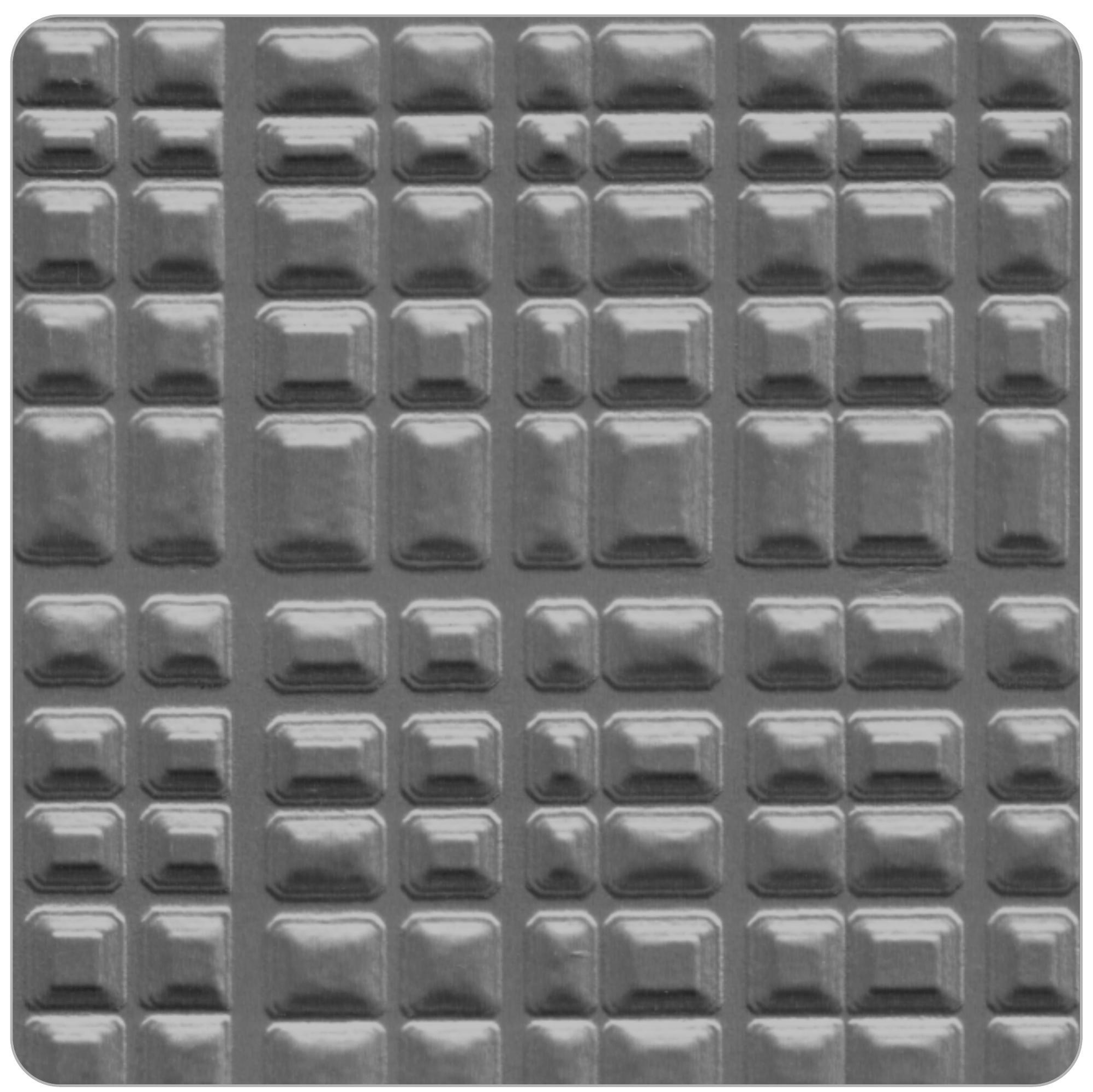 Grey glossy laminate with geometric pattern of raised rectangular shapes.