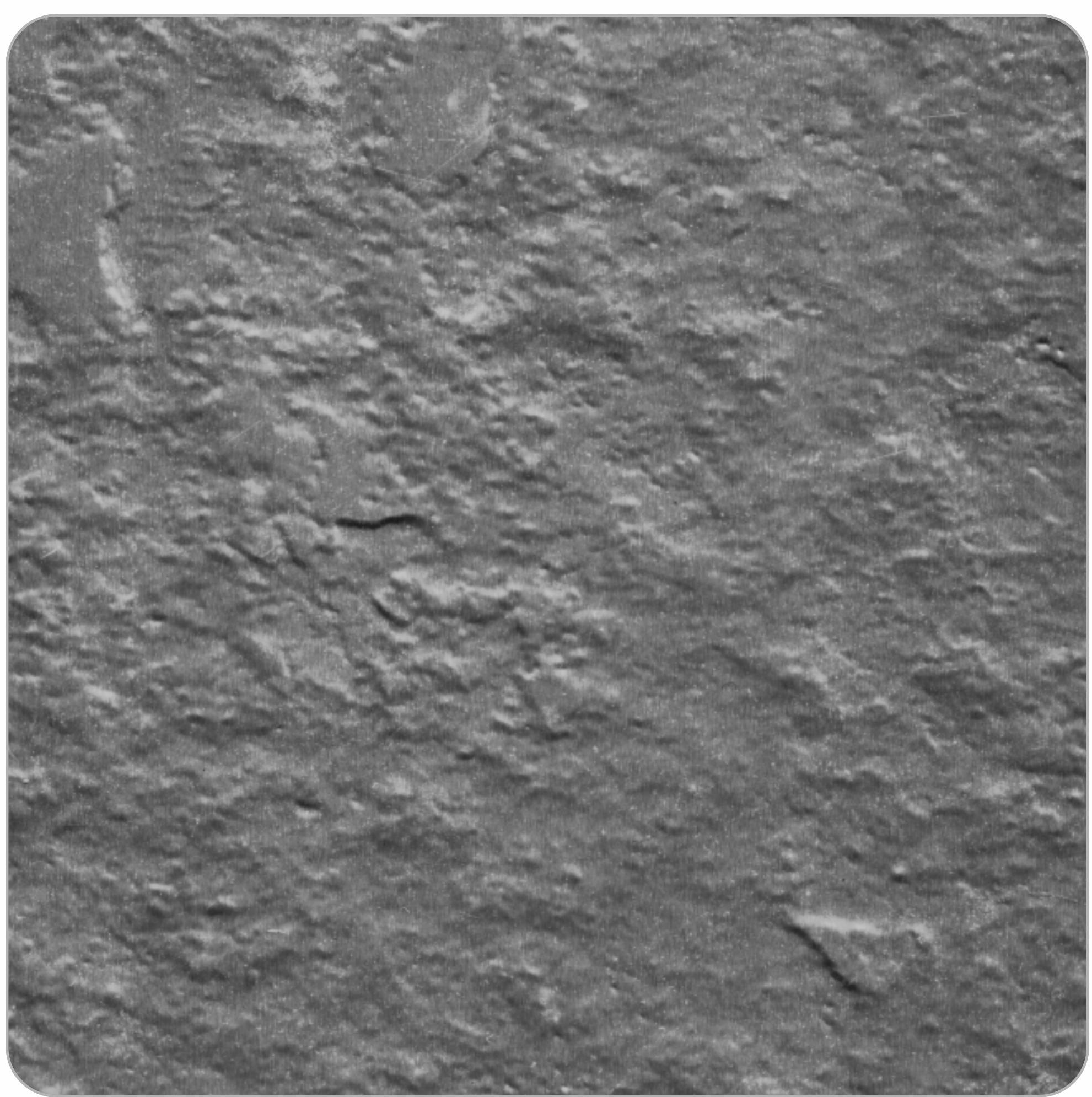 Grey textured laminate with rough, uneven surface and subtle marble-like pattern.