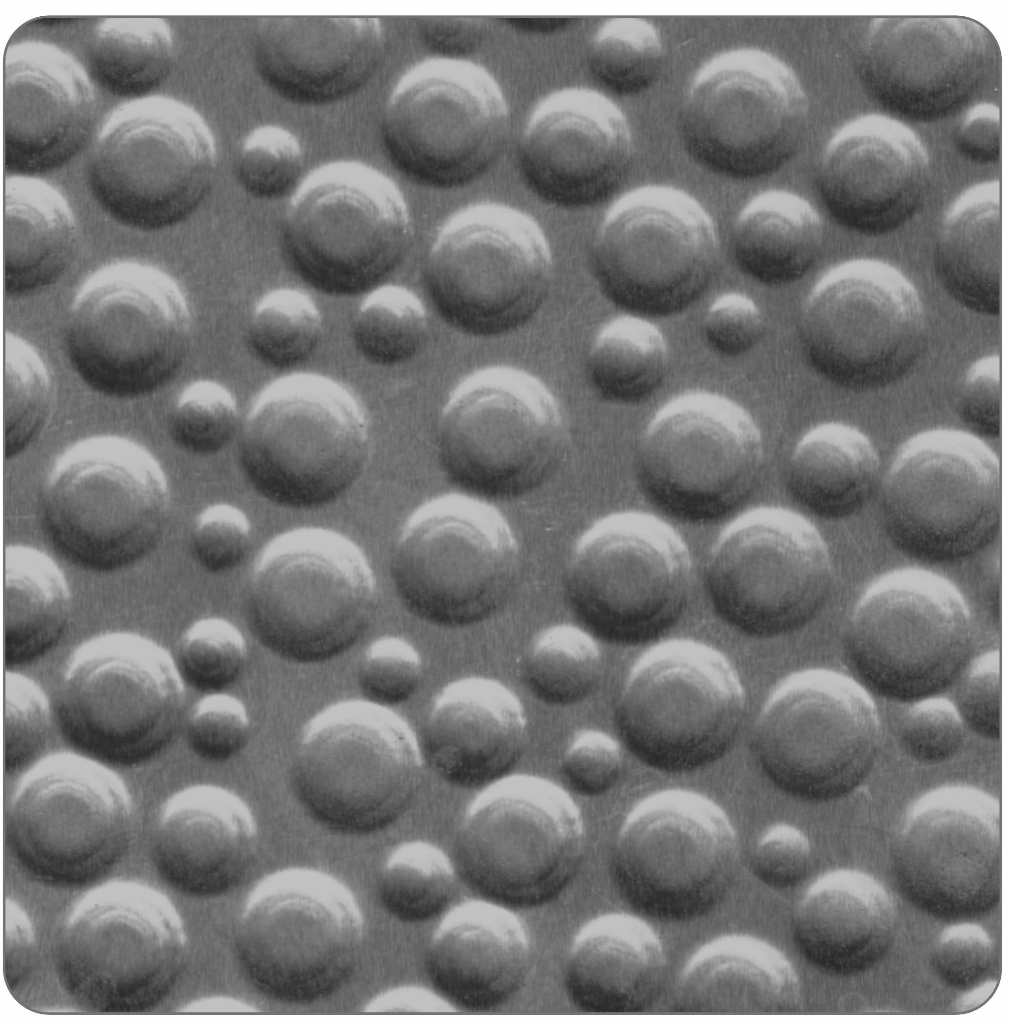 High gloss grey laminate with geometric pattern of raised circular dots.