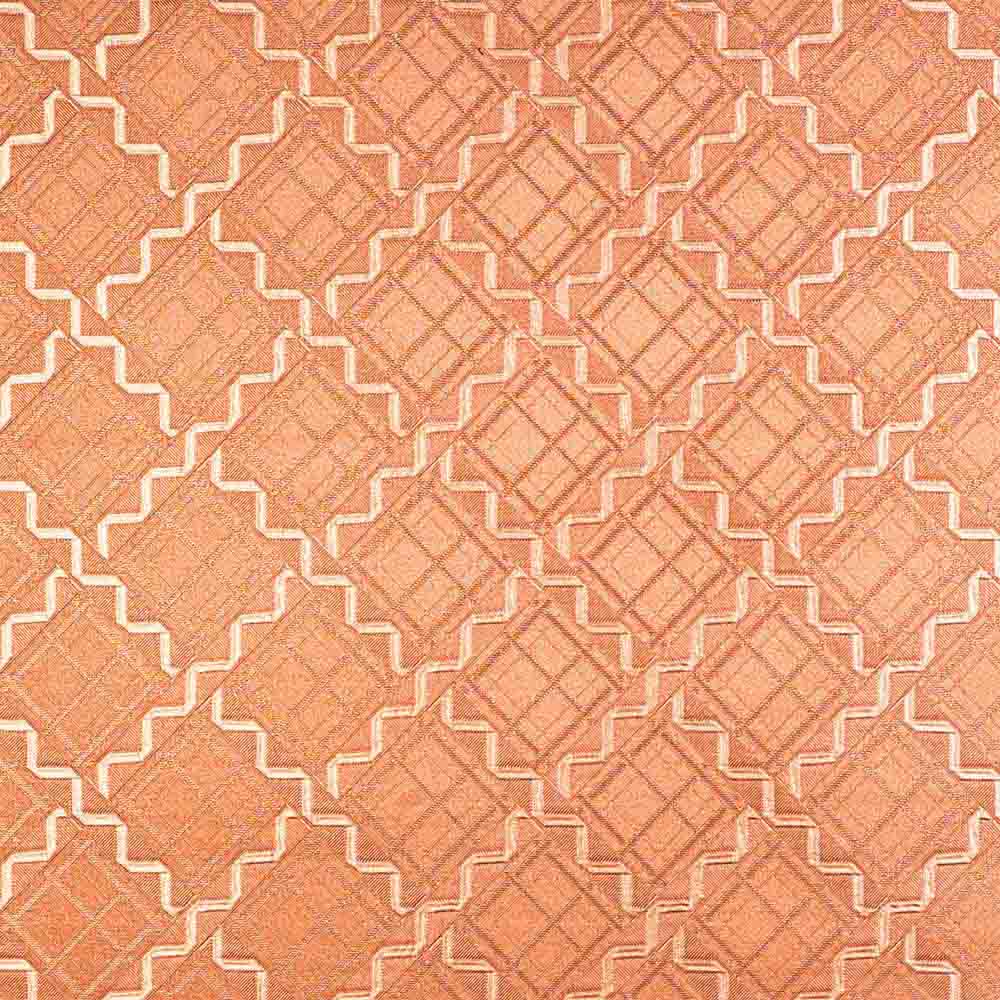 Orange designer laminate with geometric pattern and texture finish, featuring diamond shapes and zigzag lines in repeating