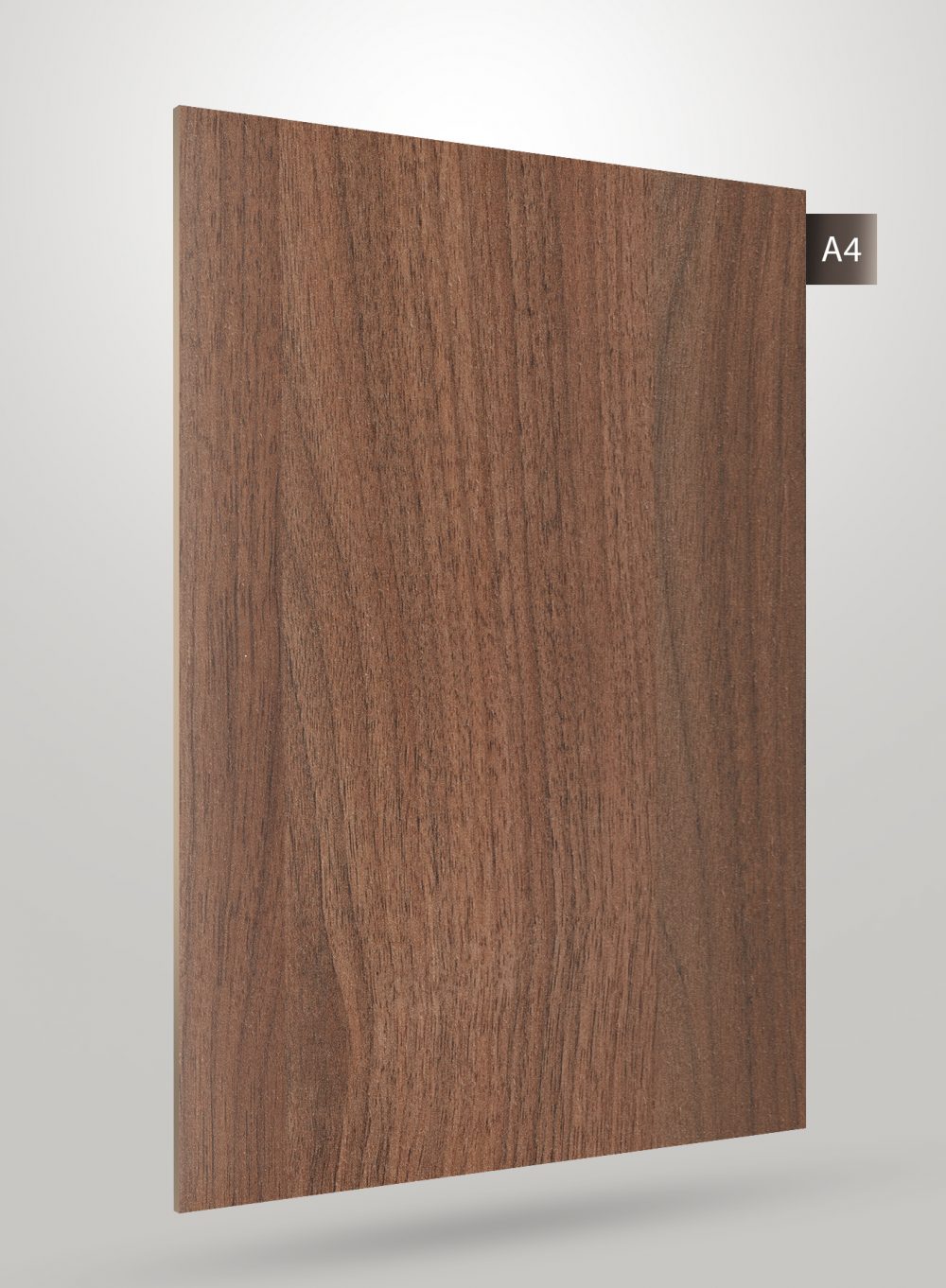 Brown wood grain decorative laminate with matte finish and visible wood texture on a square sample sheet.