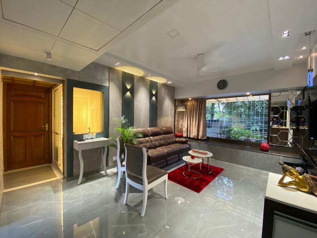 Green wood laminate wall panels with matte finish in modern living room interior with furniture and decor elements