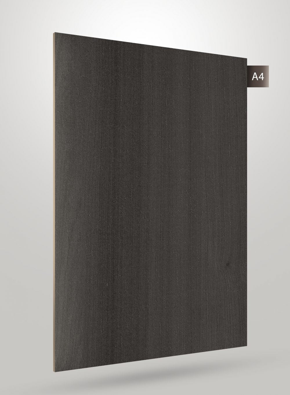 Matte black wood veneer laminate with vertical grain texture and subtle sheen on a sample sheet.