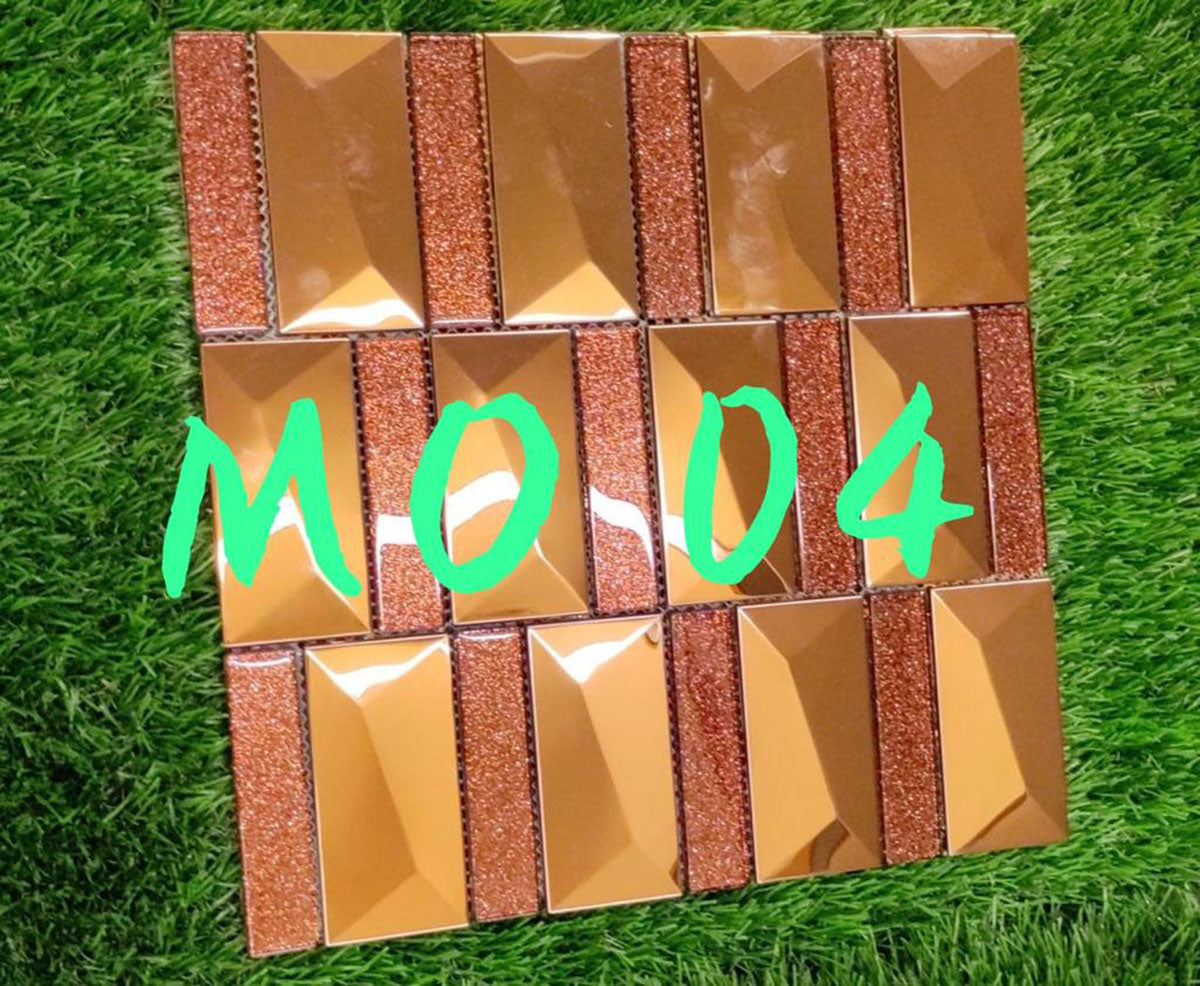 Gold metallic louver panel with textured finish and shiny surface, arranged in grid pattern on green grass background