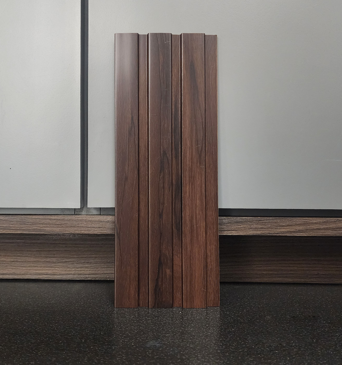 Dark walnut wood-grain fluted louver sample, Mystic MN-9503
