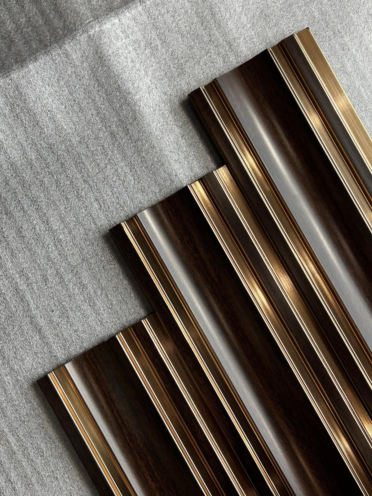 Dark brown wood louver with gold strips, Mystic Walluxe MN-9579