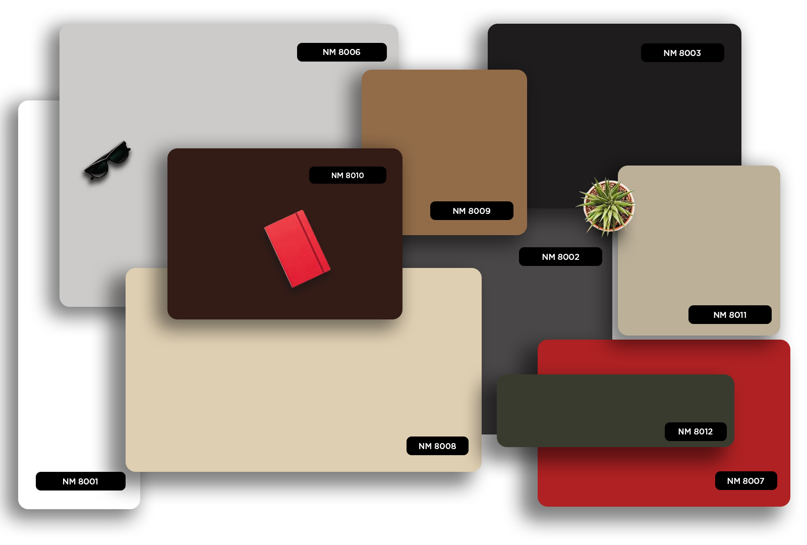 Multi-coloured solid laminate samples with glossy finish and various colour codes displayed alongside decorative items.