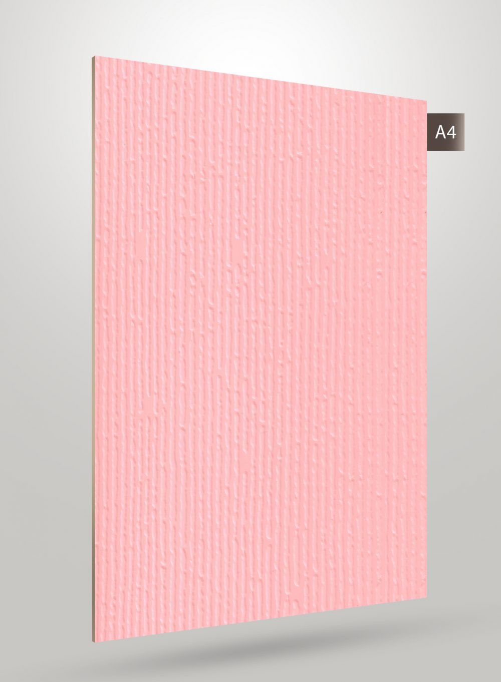 Matte pink fluted laminate with vertical ridges and textured surface, decorative interior material for walls and furniture.