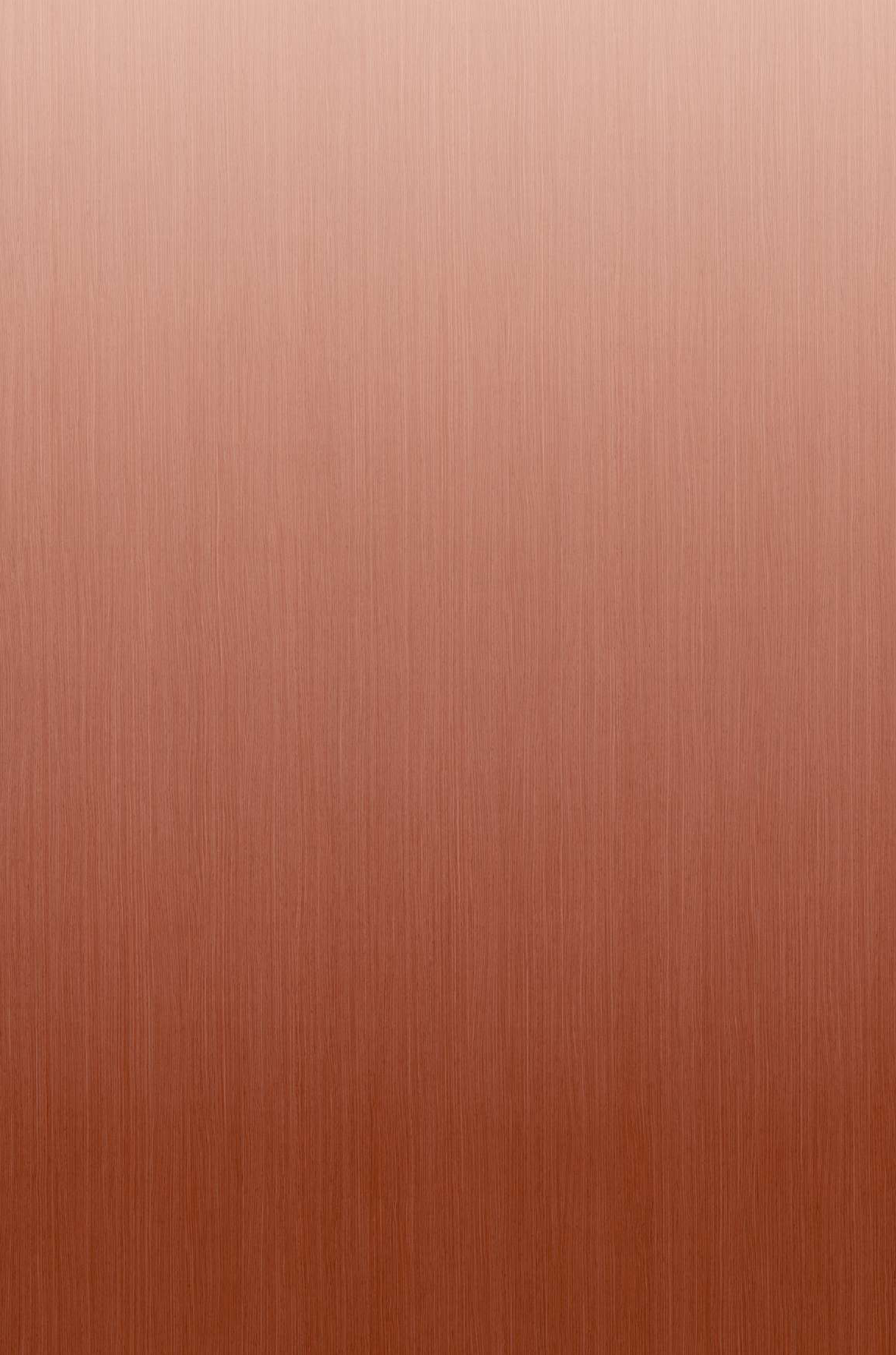 Gradient laminate in warm terracotta and rust tones with a fine brushed texture and matte finish.