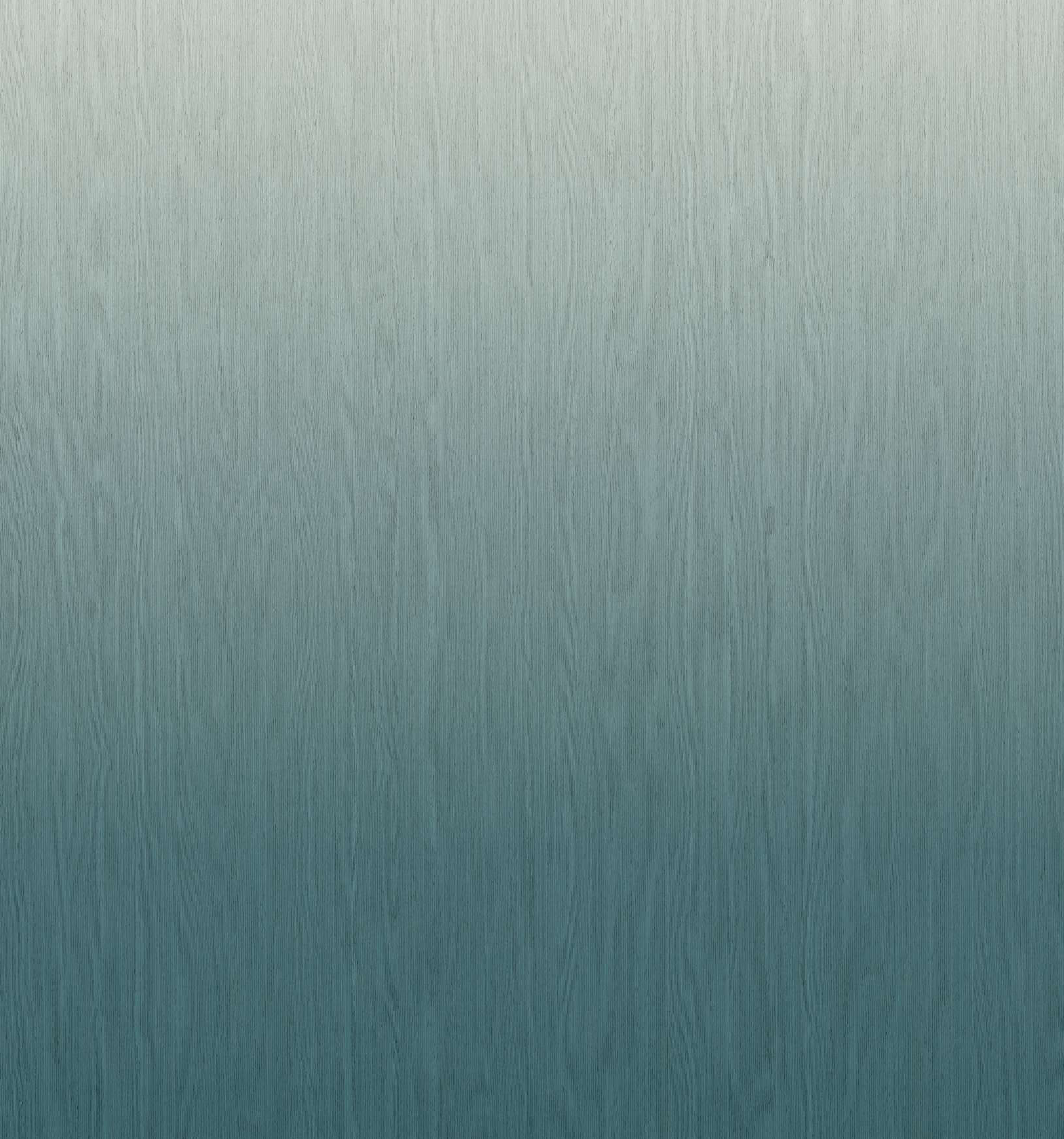Gradient laminate fading from light silver to deep teal blue with a fine brushed texture, matte finish.