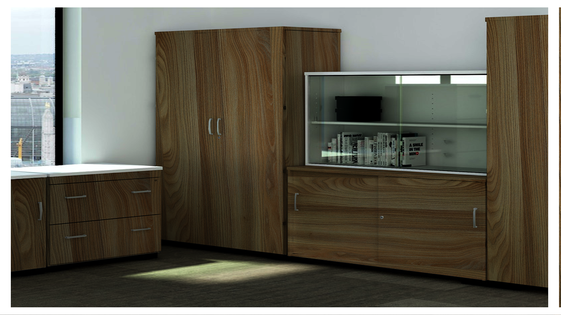 Brown wood grain laminate cabinetry with glass door and silver handles in modern office setting with natural light.