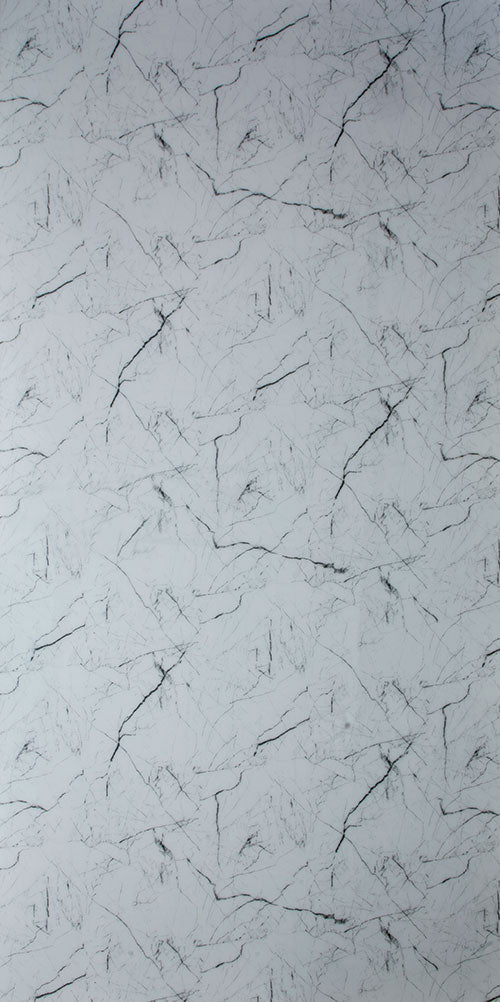 Grey marble laminate with mirror finish and veining pattern, showing reflective sheen and detailed texture.