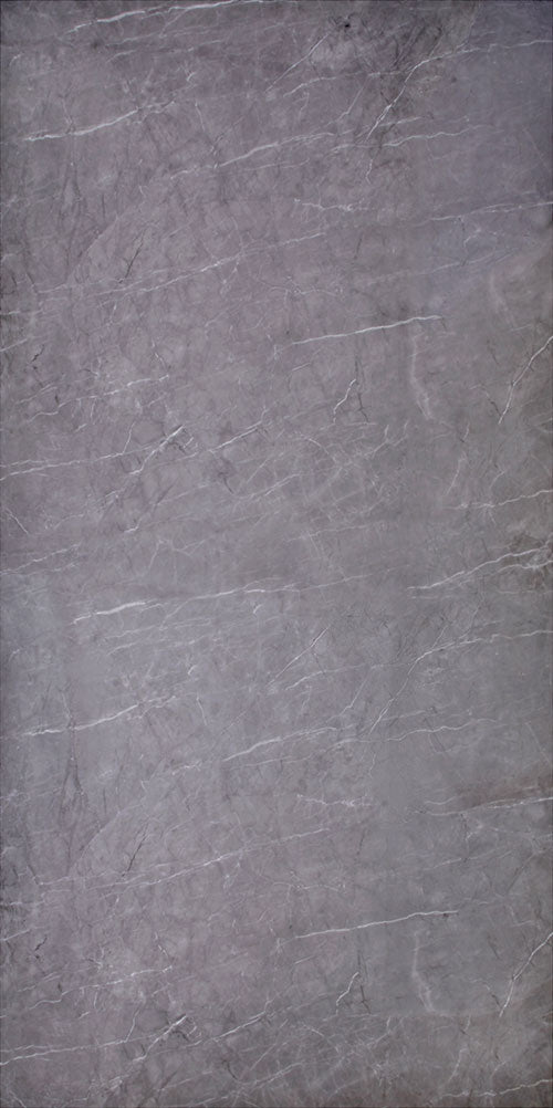 Grey marble laminate with mirror finish and white veining pattern, showing textured surface and reflective sheen.
