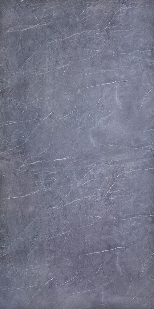 Grey marble laminate with mirror finish and white veining pattern, showing a smooth reflective surface and detailed texture.