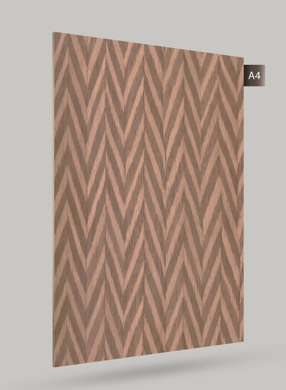 Brown wood laminate with chevron pattern and matte finish, showing wood grain texture and subtle sheen variation.