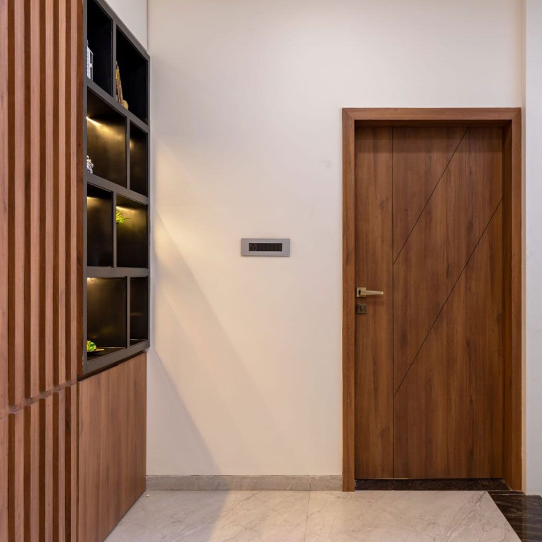 Brown wood laminate door and cabinet with diagonal pattern and matte finish in modern interior setting.