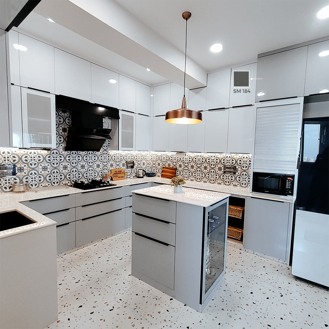 Brown matte laminate SM 184 used on kitchen cabinets in a modern white kitchen with patterned backsplash and terrazzo floor