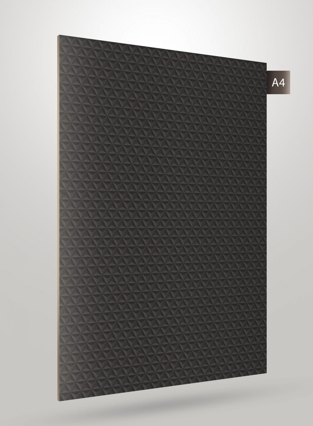 Matte black laminate sheet with geometric pyramid pattern and textured finish, displayed at an angle with A4 label.