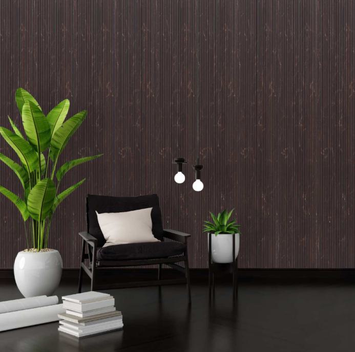 Brown marble louvers wall with vertical texture and subtle sheen in a modern room setting with furniture and plants