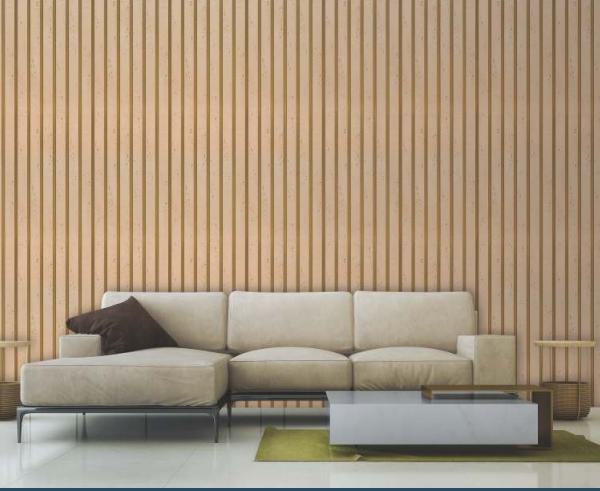 Brown wood louver panel with vertical slats and wood grain texture on a living room wall behind a beige sofa