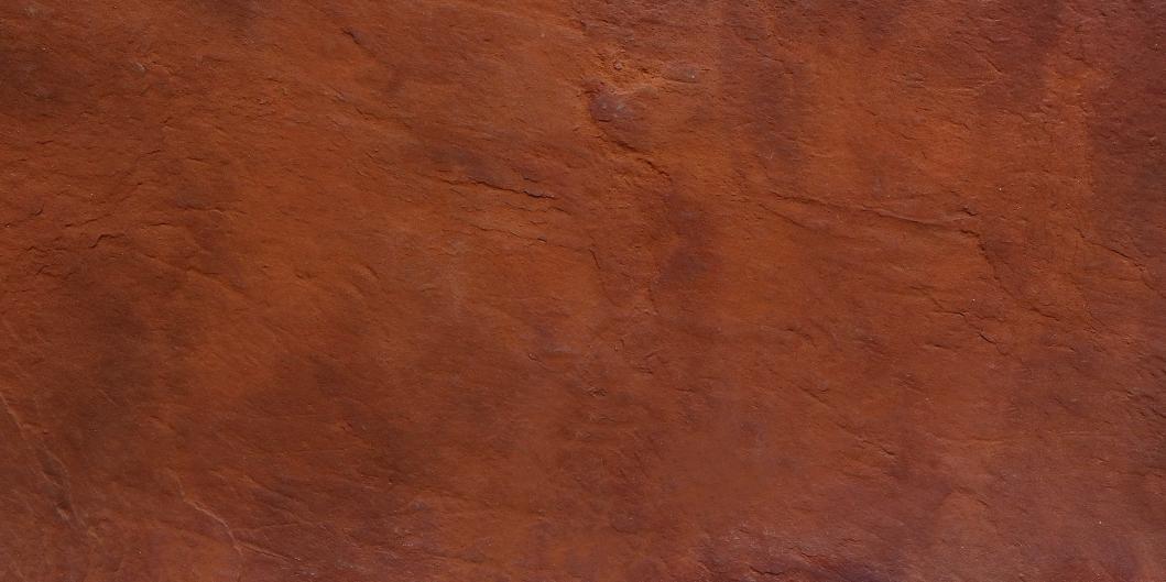 Brown designer louver with textured rough surface and earthy tone variations